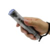 Police Force 9.2M tactical stun flashlight in hand