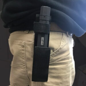 Streetwise 24/7 Security Guard Stun Gun Flashlight - in holster on hip