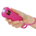 Trigger Stun Gun Flashlight pink in hand