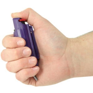 Streetwise 18 Pepper Spray 1/2 oz. Hard Case Purple in hand